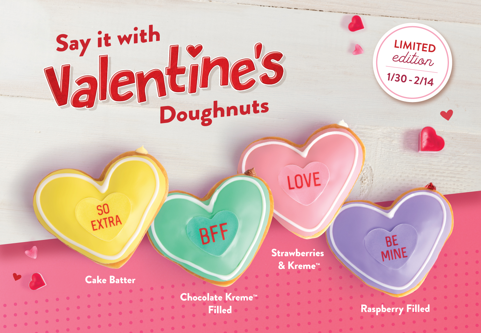 Say it with Valentines's conversation doughnuts: the yellow doughnut with red text says, "So Extra"; the green doughnut with red text says, "Love"; the pink doughnut with red text says, "BFF"; and the purple doughnut with red text says, "Be Mine".